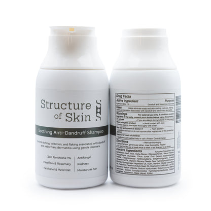 Two bottles of Structure of Skin anti-dandruff shampoo on a white background